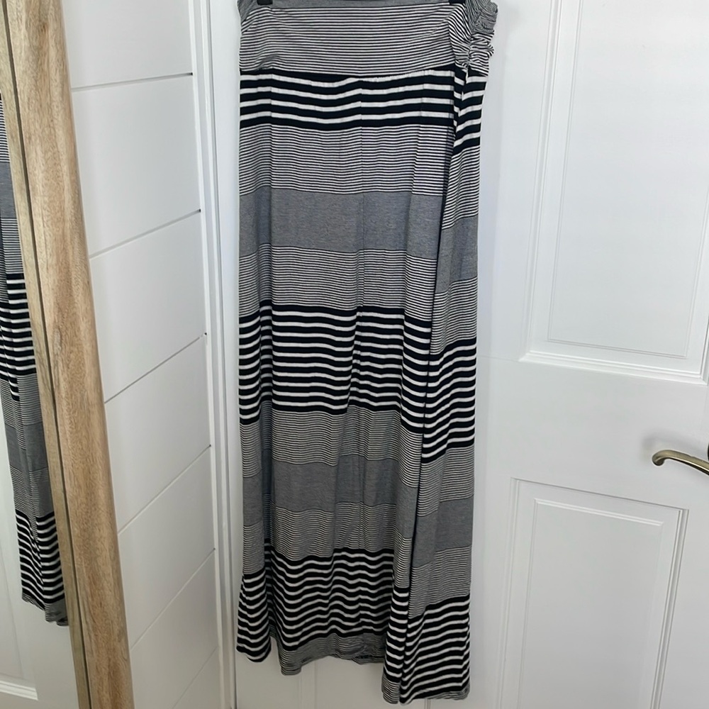 Two Maxi skirts/ soft spand/rayon gently worn size S b/w stripe and solid black